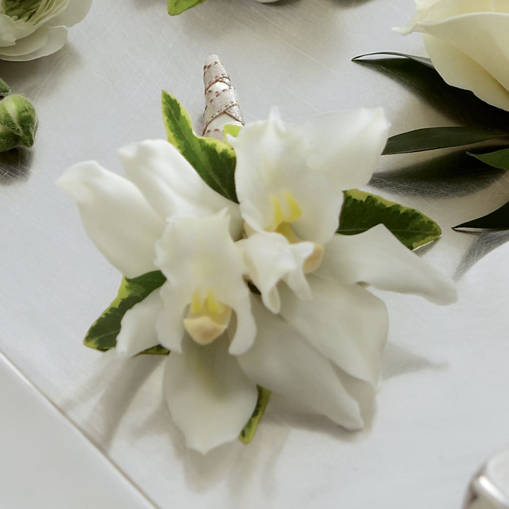White Mini Cymbidium Boutonniere – Blakley Flower Shop Llc, Blakely GA